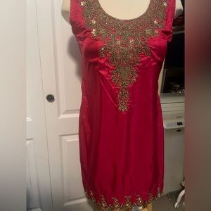 Deep pink suit top with gold dupatta
